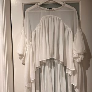 High Low off white blouse with beaded neck